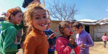 Children outside their shelters in Lebanon refugee camp