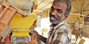 Thiyagalingam operates the machines at a block-making yard under the EU project in Sri Lanka