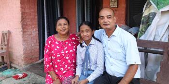 Jodu (right) with his wife Sita (left) and daughter Tenisha at their Nepal home