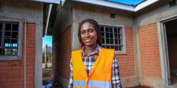 Woman standing in a construction site