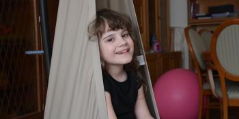 A young girl on a swing