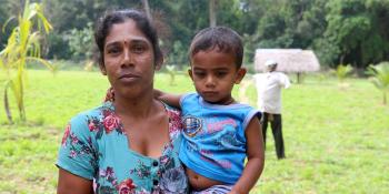 Jeyanthini, with her son Satheeshan, built her home with compressed stabilized earth blocks in Sri Lanka