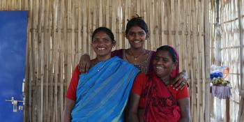 Aarti and her family at their bamboo home in Nepal