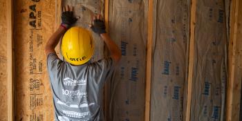 RV Care-A-Vanner volunteer works on the build site.