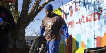 Community members volunteer for a neighborhood clean-up day at the Community House.