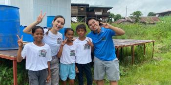 Volunteer (2nd from L) and co-founder (R) of The Modern Balsa Initiative with children from Sabang Adgawan, Philippines