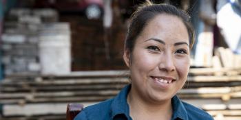 Young Mexican woman smiling.