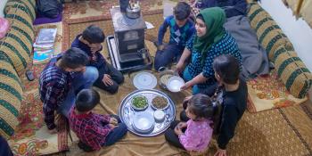 Photo: Mother serving food to children, Lebanon