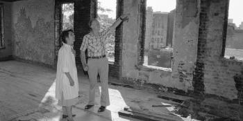 The Carters standing in a home.