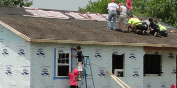 Volunteers working on Hancock County Habitat house