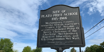 Historical marker with information on the Plato Price School.