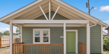 Small accessory dwelling unit home with green door