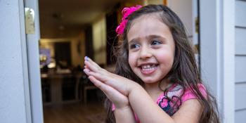 young girl smiling at camera