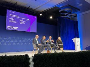 Jonathan Reckford and other panelists sitting on stage at Concordia Summit.