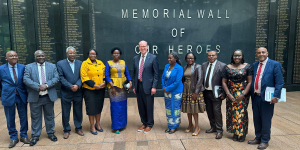 Jonathan Reckford stands for a photo with housing experts and cabinet ministers in Ethiopia. 