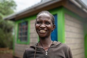 Woman in Kenya smiling for a photo