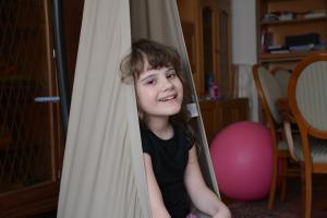 Young girl in a swing