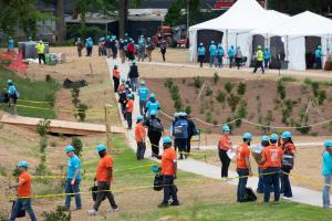 Volunteers walk to their work sites in Langston Park during the 2026 Carter Work Project in Atlanta, Georgia. 