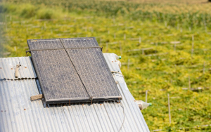 Small solar panel on a tin roof