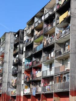 damaged appartment building in Lunik IX