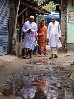 Residents of Beguntila informal settlement in Bangladesh's capital Dhaka