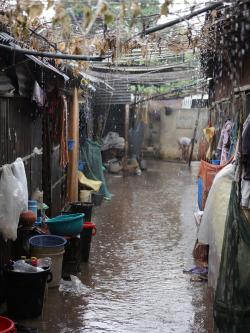 Raining in Duaripara informal settlement in Bangladesh