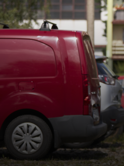 Red van in parking lot