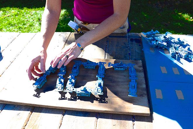 Applying light switches to distressed wood