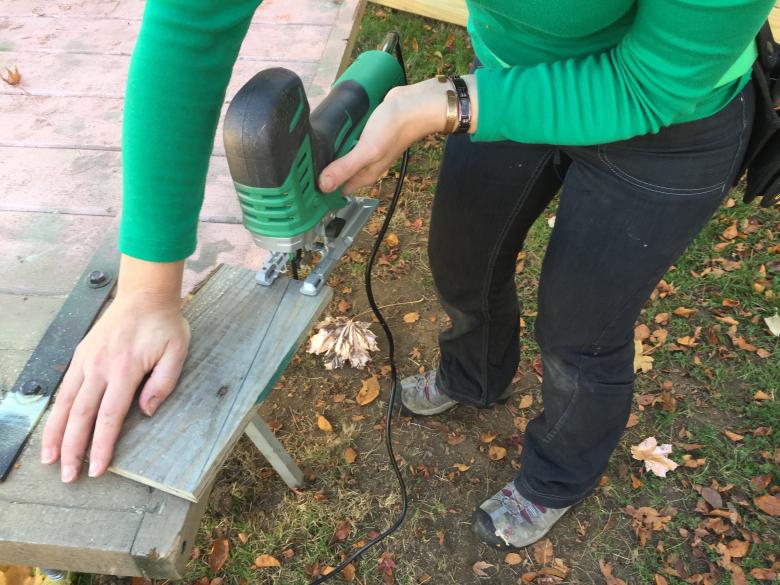 Cutting a scrap piece of pallet wood