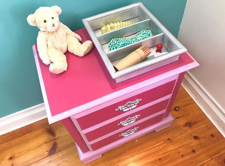 Completed refurbished dresser with metallic silver accessory tray