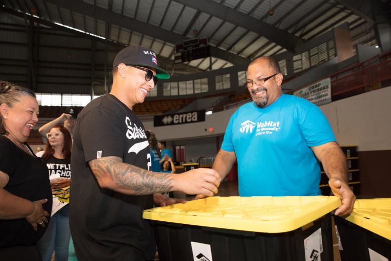 Daddy Yankee volunteer shelter repair kits
