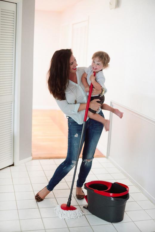 A family cleans their home.