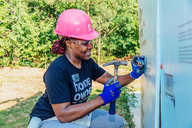 Volunteers participate in Habitat’s National Women Build Week.