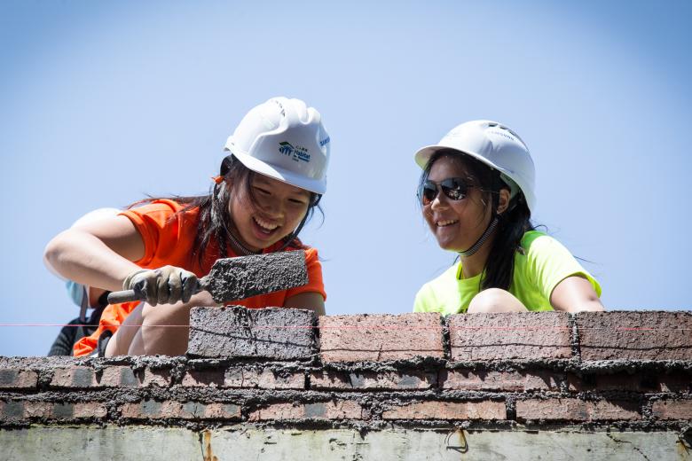 Teens on a build site.