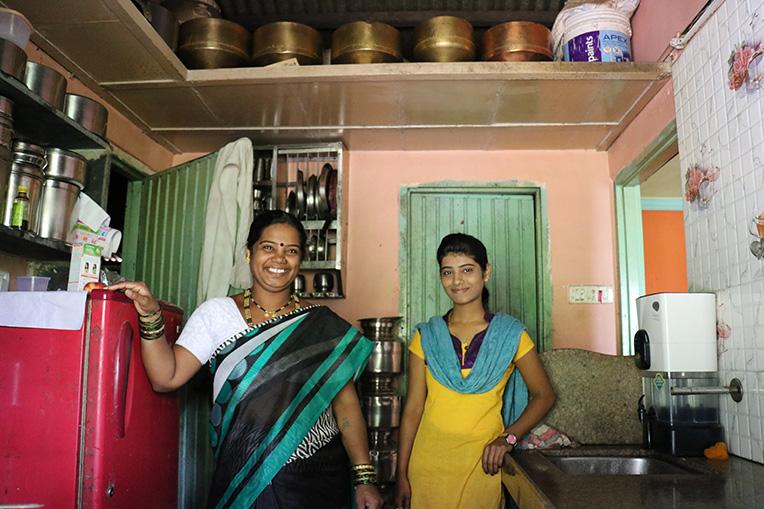 Jayshri and her daughter Komal inside their Habitat home in Lonavala, India, in 2016.
