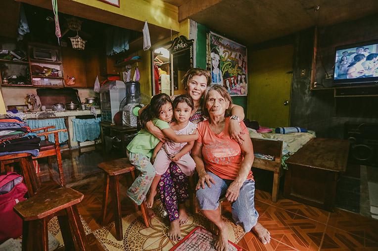 (From left) Darlene, 5, Glydel, 2, and their mother Annalyn, 43, and grandmother, Agnes, 68, in their Habitat home. 