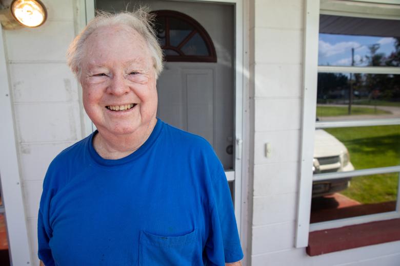 Tom at his new Habitat home. 