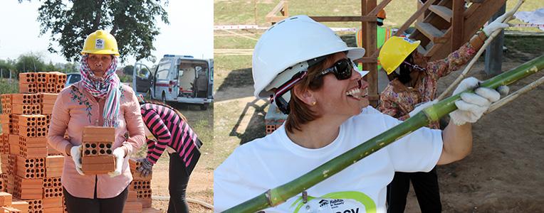 Sophal (left) and Yuth (far right) worked together with volunteers on their houses.