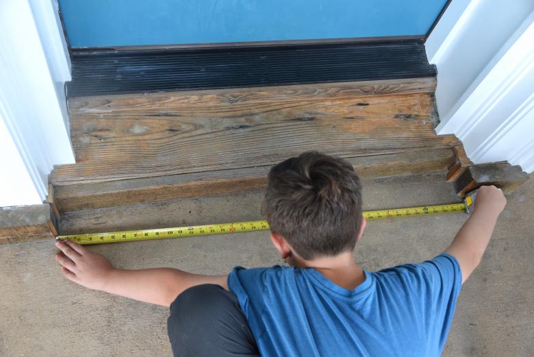 Jack measuring the doorway.