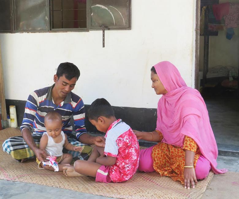 Babar and his wife Morsheda with their daughter Tayeba and son Mahim spending time at their porch.