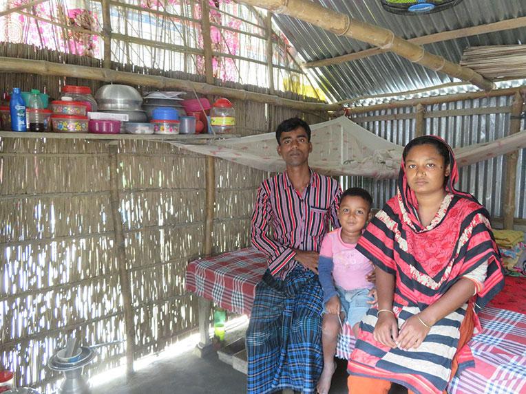 (From left) Babar with son Mahim and wife Morsheda at their old house.