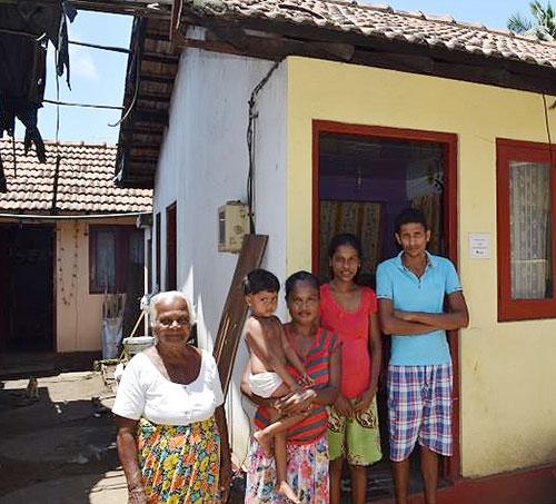 Nimasha (second from right) with her family in front of their house in Moratuwa, Sri Lanka