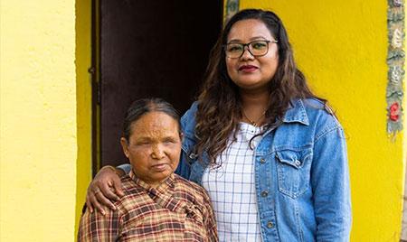 Nepali youth leader Nita (right) with her neighbor Dhamosari