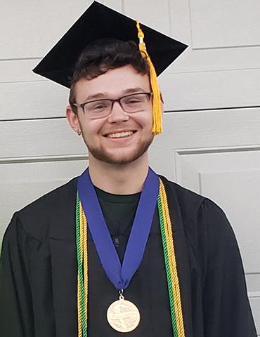 Christina's son Joseph in his graduation cap and gown.