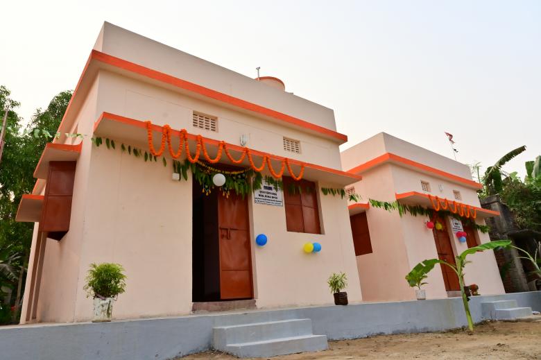 A house with orange trimmings in India. 
