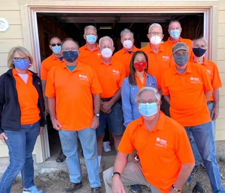 Cliff and the electrical crew in orange shirts.