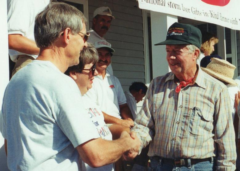 Dale Larson shaking hands with Jimmy Carter