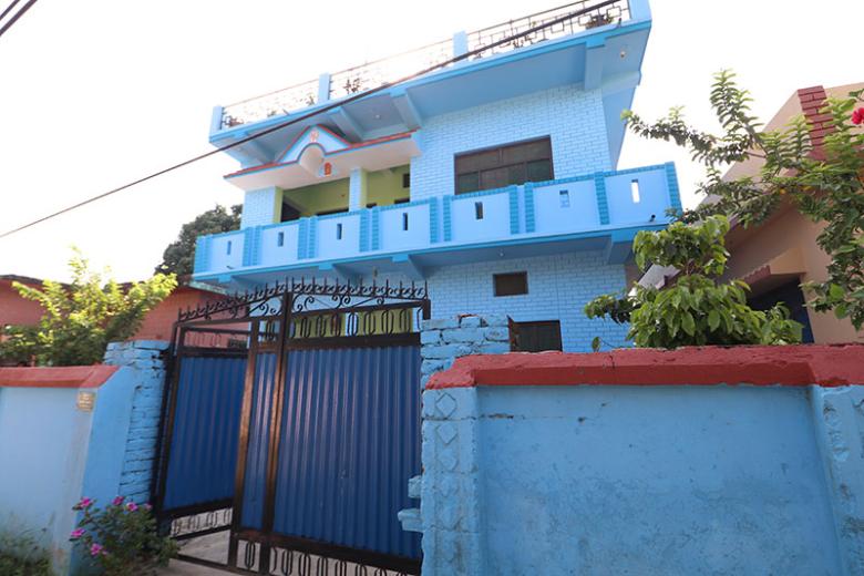 Mohan expanded his one-story house in Nepal by another story