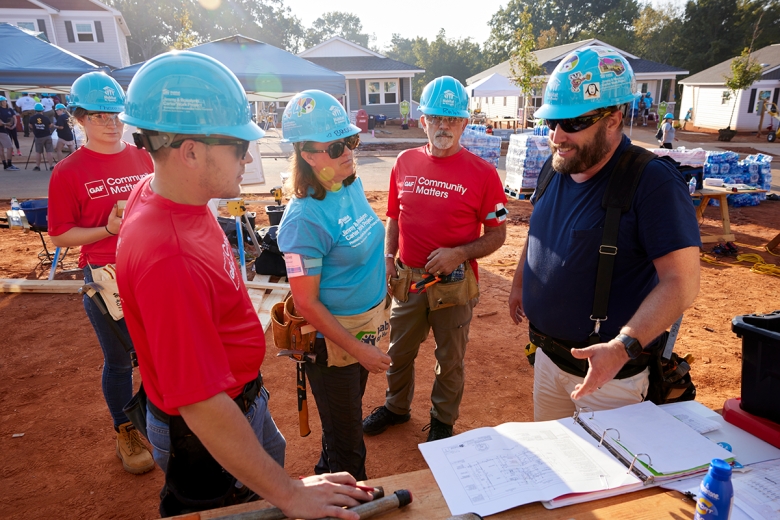 Volunteers talking.