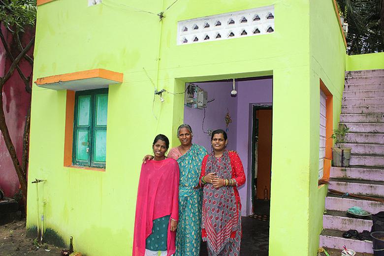 Rani (center), who survived 2004 tsunami in India, with her daughters Pavya (left) and Narmatha